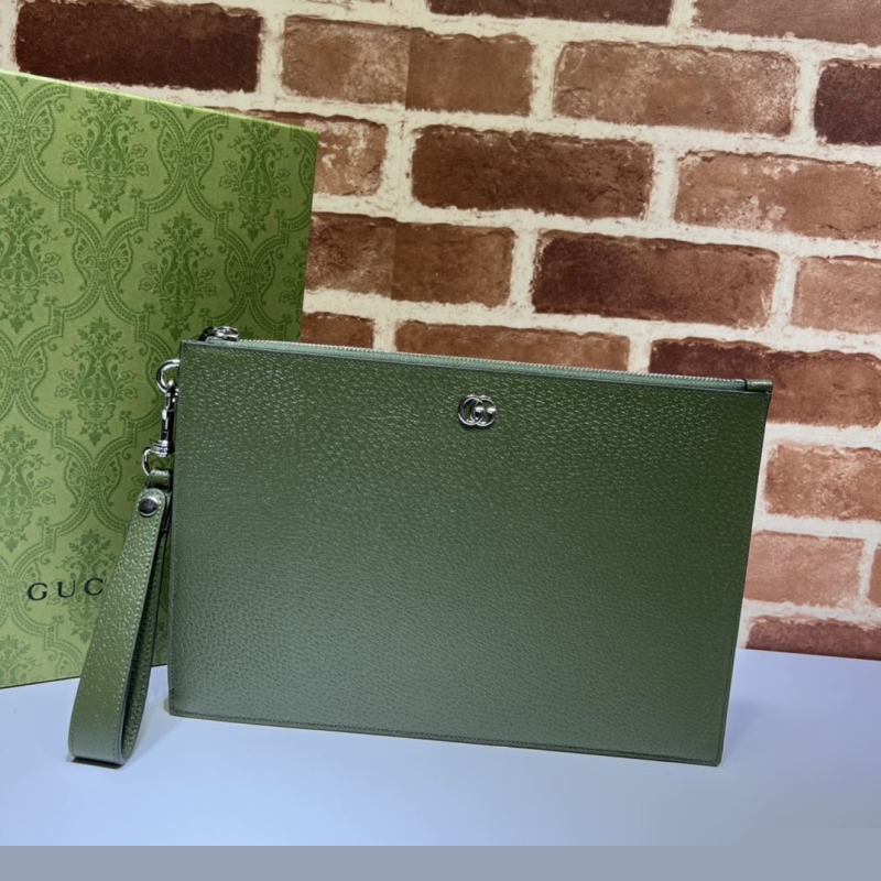 G*u*i clutch bags